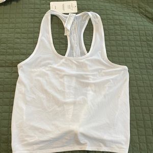 White Fabletics workout top